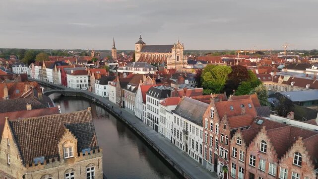 Aerial Approach to St. Walburga Church Facade at Sunset, Bruges, Belgium