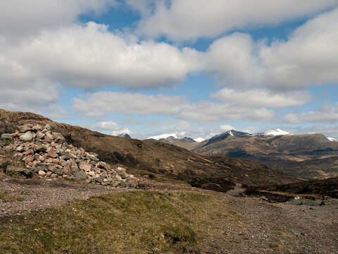 View north to Ben Nevis and The Mamores mountains from the West Highland Way walking trail at the top of the Devil's Staircase above Glencoe, Highlands of Scotland.