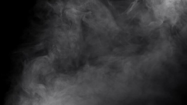 Cinematic Ethereal Fog & Mist Overlay. Focusing on the movement and texture of fog, smoke, and mist against a stark black background , slow-moving wisps and vertical "falling" transitions.