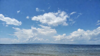 Fototapeta premium Open sea under scattered clouds at distant horizon