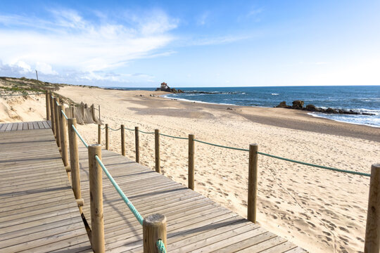 Wooden Boardwalk at Miramar Beach Overlooking the Atlantic and Senhor da Pedra Chapel