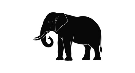 Fototapeta premium Elephant silhouette standing with trunk curled downwards and tusks