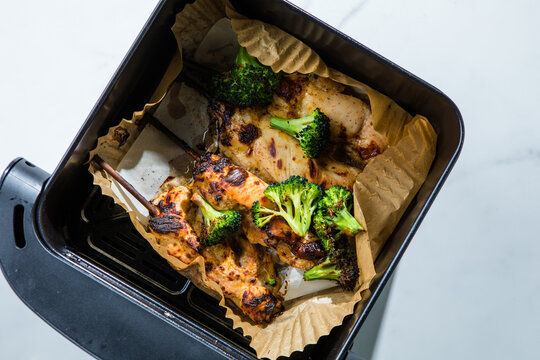 shish kebab - grilled bbq chicken. Top view of crispy golden chicken cooked in an air fryer