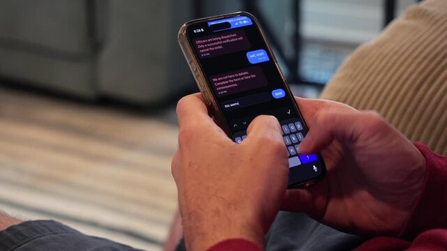 Close-up of smishing attempt on a mobile device showing a fake legal notice and a data collection form used by hackers to steal personal information