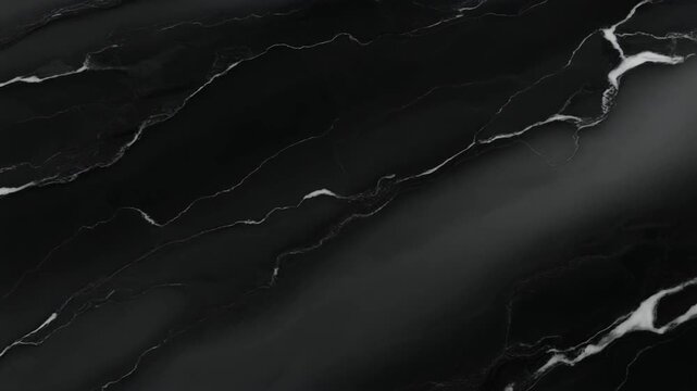 Close up of polished black marble slab with subtle white veining and soft light motion. Realistic architectural stone.