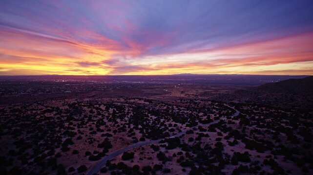 Aerial shot of desert plateaus and red rock ridges