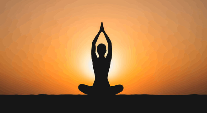 Peaceful meditation silhouette in lotus pose at sunset
