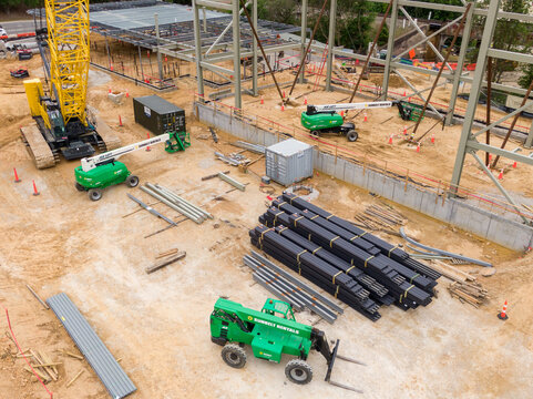 Aerial Perspective of Heavy Equipment and Material Staging at Red Hat Amphitheater Construction Site, Raleigh NC