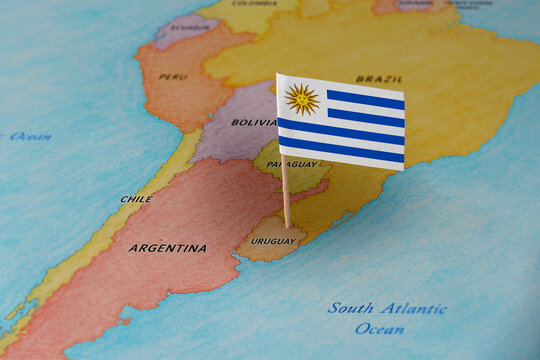  Uruguay flag pin marking Uruguay on South America map, travel destination concept