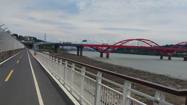 View of bike path, New Taipei City, Taiwan &ndash; May 12, 2026: Views of Danjiang Bridge, New Taipei City, Taiwan