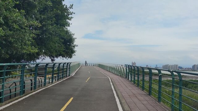 View of bike path, New Taipei City, Taiwan &ndash; May 12, 2026: Views of Danjiang Bridge, New Taipei City, Taiwan