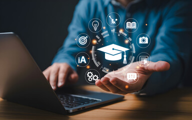 Fototapeta premium Person with laptop displaying digital education icons in a modern setting