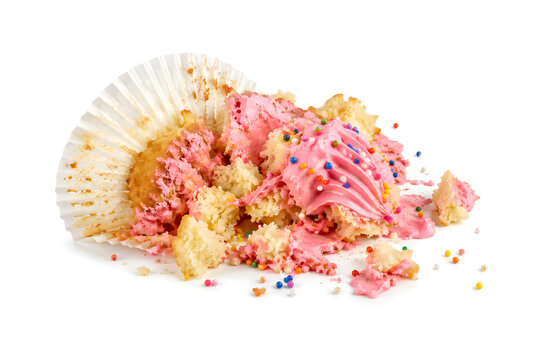 Crushed cupcake, pink frosting, colorful sprinkles, broken birthday cake dessert isolated on white background, sweet bakery confection with creamy icing and colorful candy toppings, delicious pastry t
