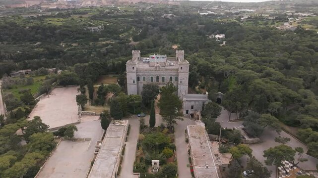 Flyover Verdala Palace In The Buskett Gardens Of Malta. Aerial Drone Shot