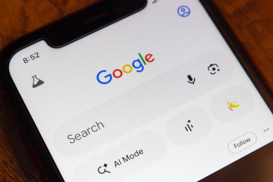 Mexico City, MEXICO - Mar 31 2026 : Close-up of a smartphone displaying the Google, featuring the Google logo, search bar, voice and lens icons, and an AI Mode shortcut at the bottom.