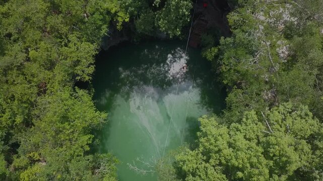 slackline in a cenote yucatan mexico