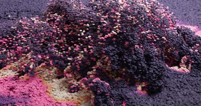 Dense clusters of colorful particles create an organic flowing abstract structure in soft lighting.