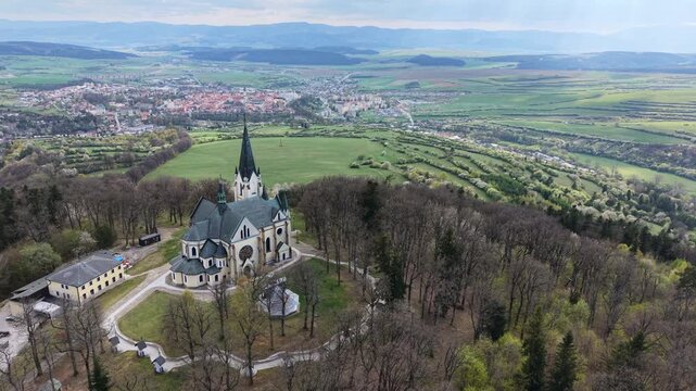 Beautiful aerial footage showing the historic Basilica of the Nativity of the Virgin Mary, a prominent pilgrimage site in Marianka, Slovakia