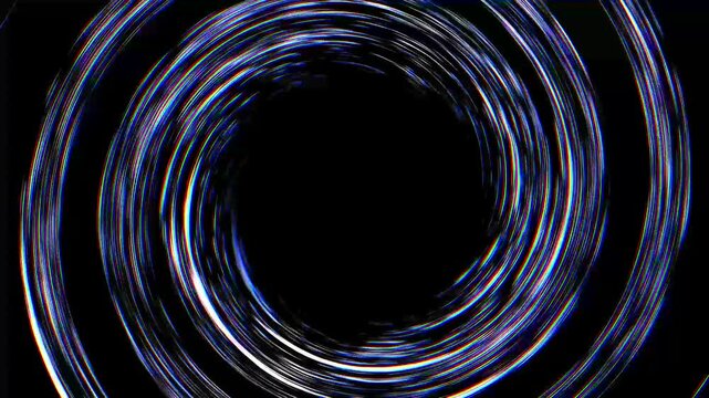 Spiral light trails creating vortex effect in dark space