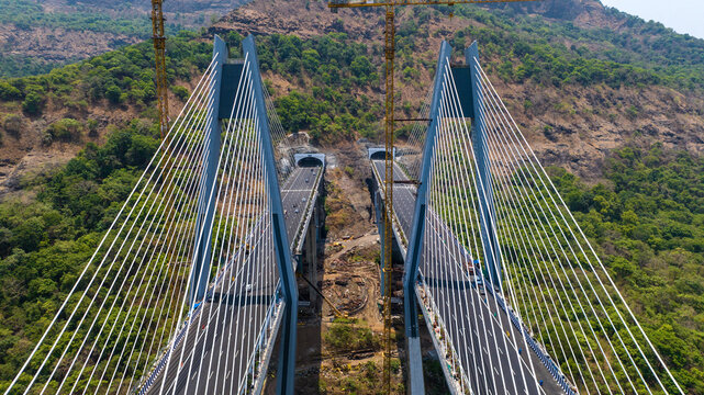 Drone Shot of Modern Expressway Bridge in Maharashtra
Aerial View of Sahyadri Expressway Bridge and Tunnel
Drone View of India&rsquo;s Highest Cable Stayed Bridge