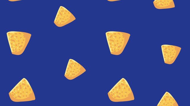 Crunchy yellow nacho chips falling on deep blue background in seamless loop motion for snack food advertising.