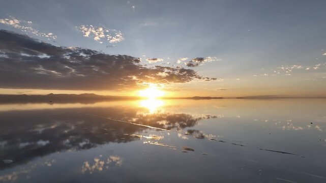 Salar de Uyuni in Bolivia during sunset. Aerial image Rainy Season.Time lapse.
