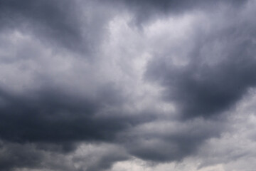 Fototapeta premium Dark storm clouds covering the sky background