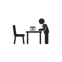 Fototapeta premium Person standing at a desk.