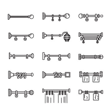 Collection of curtain rods and finials in a linear pattern against a white background