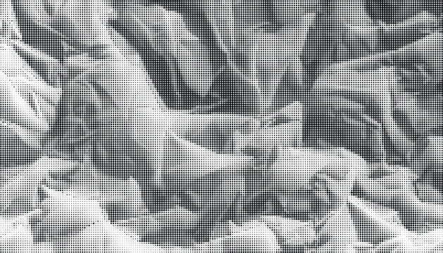 Crinkled paper texture fills the frame with rumpled sheets.