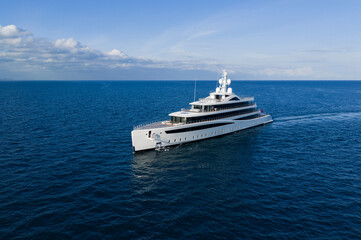 Obraz premium Yacht boat tour. Luxury boat yachting. Motorboat sailing at sea. Luxury private yacht in sea. Motor yacht luxury vessel. Boat motor aerial. Vacation on summer. Aerial view motorboat