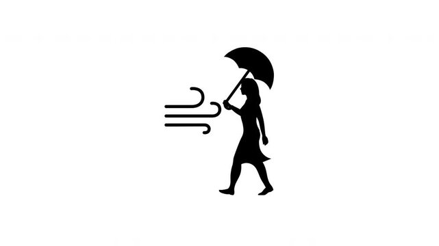 メイストームで飛ばされそうになっている女性　