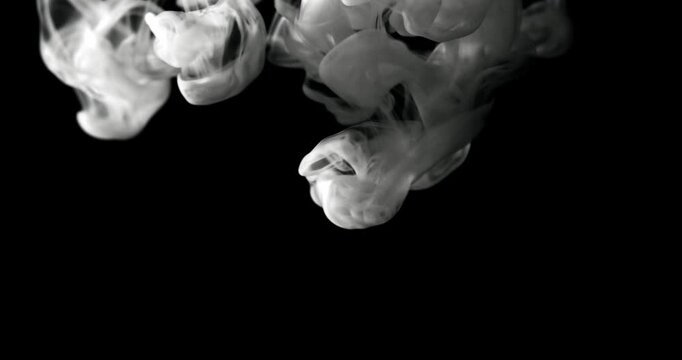 White water vapor drifting and flowing effect against a black background