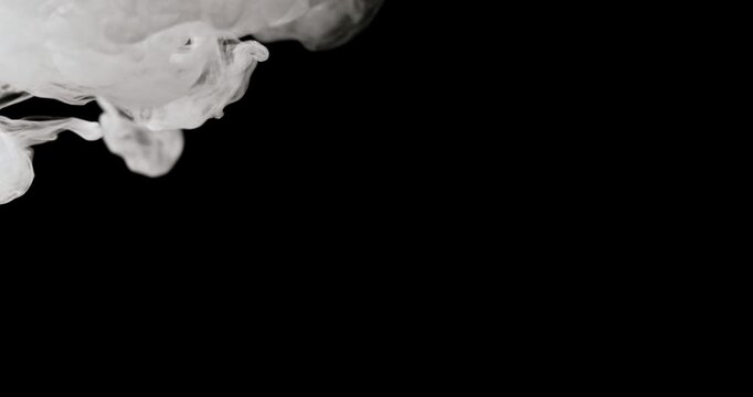 White water vapor drifting and flowing effect against a black background