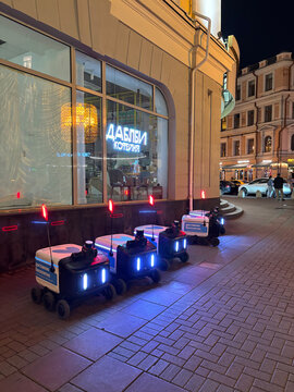 Moscow, Russia September 21, 2025: Arbat Street, robot couriers on the sidewalk.