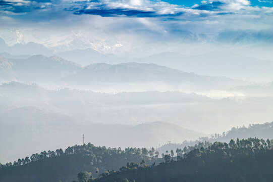 Panoramic View of Hazy Himalayan Mountain Ranges at Dawn from Kanarkha Village, Kumaon, Uttarakhand, India