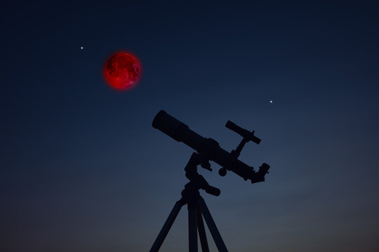 Astronomy telescope for observing Lunar eclipse, stars, planets and other celestial Milky Way objects.