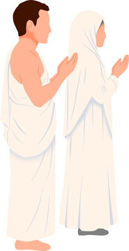couple in ihram clothing performing prayer