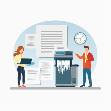 Office workers shredding documents with a paper shredder