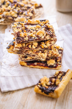 German Prasselkuchen - puff pastry cake filled with jelly and fruits and crumbles