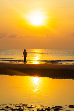 Sunrise and silhouette traveler