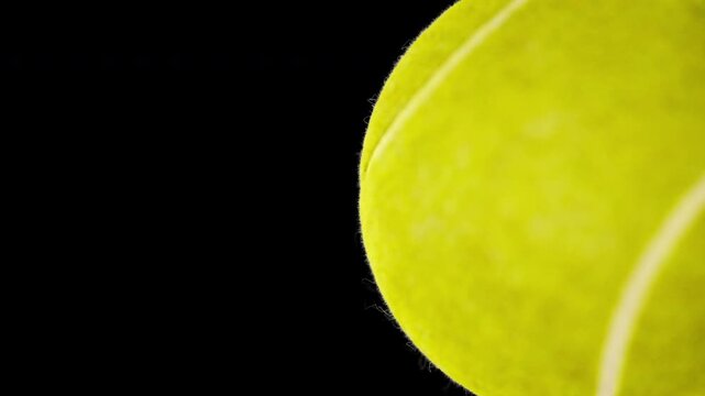 Tennis Ball Transition on black and green background
