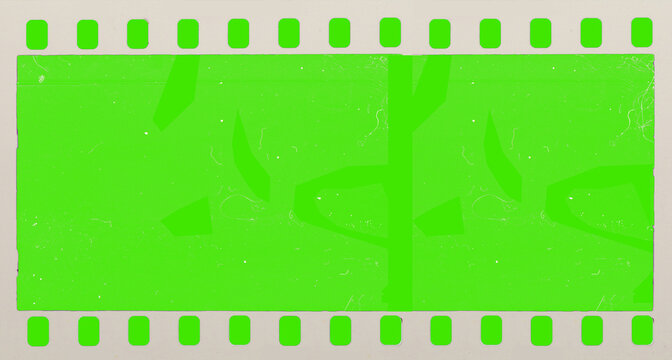 Vintage film strip with green background, perforations and subtle scratches