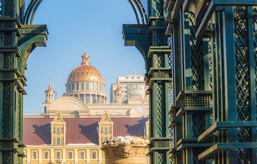 Russian-style architecture, framed by a steel structure, stands out in the heart of Harbin, China. © Thananchanok