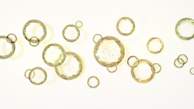 明るい背景に浮かぶ黄金色の透明な泡と水滴の3D抽象デザイン / 3D abstract design of golden transparent bubbles and water droplets floating on bright background