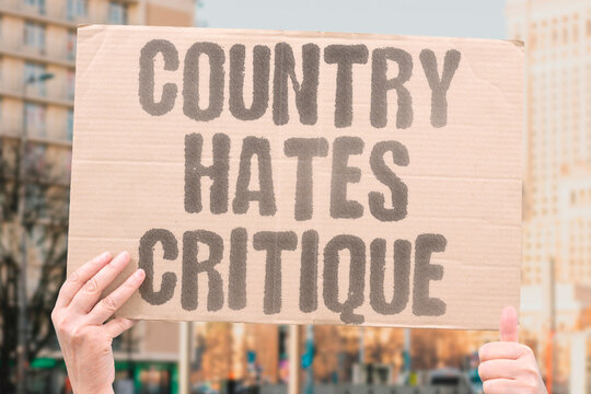 "Country Hates Critique" Criticizing national policy is labeled betrayal not criticism. QUESTIONING. NATIONAL. POLICY. BETRAYAL. CRITICISM.