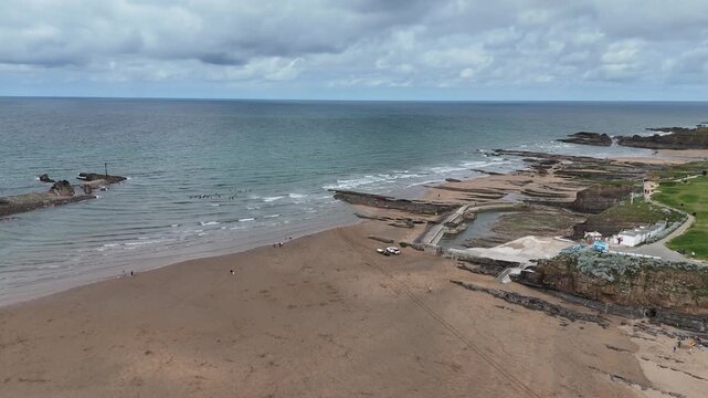 4K aerial drone footage of Summerleaze Beach and sea pool in Bude Cornwall England