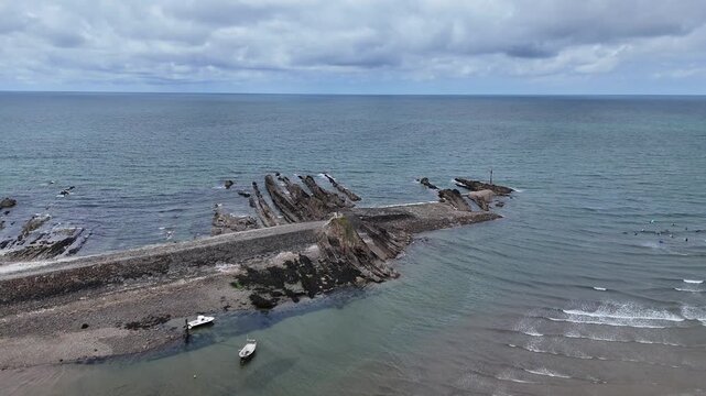 4K aerial drone footage of Summerleaze Beach and sea pool in Bude Cornwall England