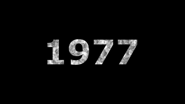 A dynamic Glowing neon text 1977 number countdown timer animation. Old film style historical year loop. Minimal countdown or year concept animation.