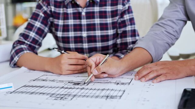 Close up hands of Architect and engineer. Team discussion about building construction. design brainstorming, sharing, talking about Structural design.